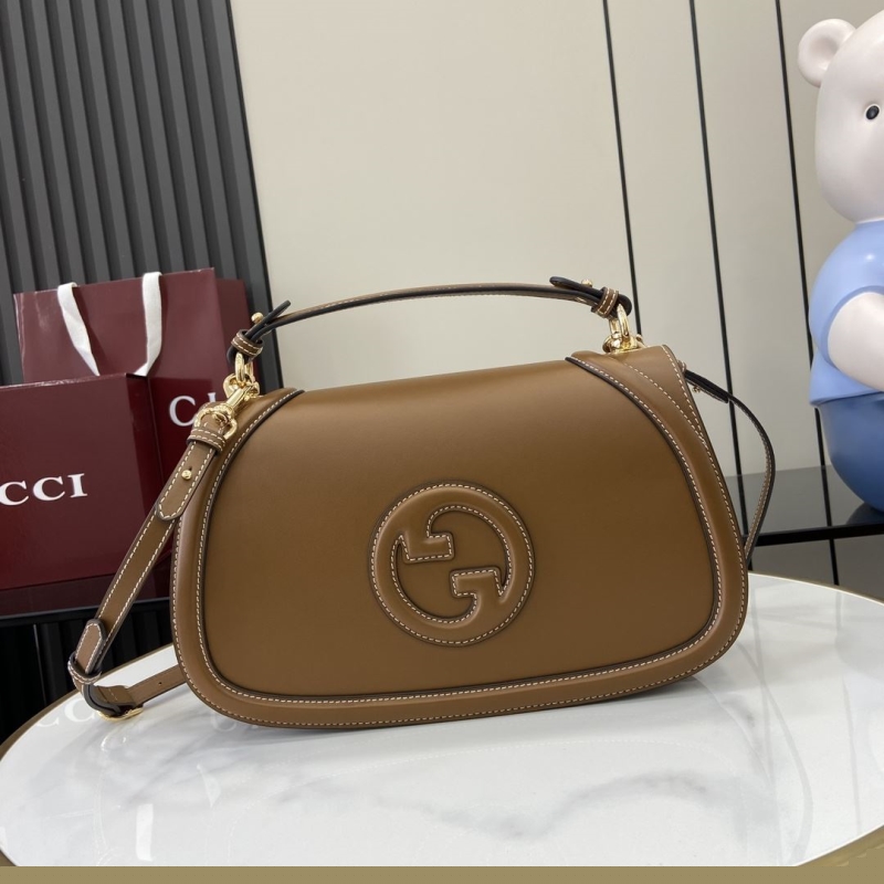 G*u*i top handle bags